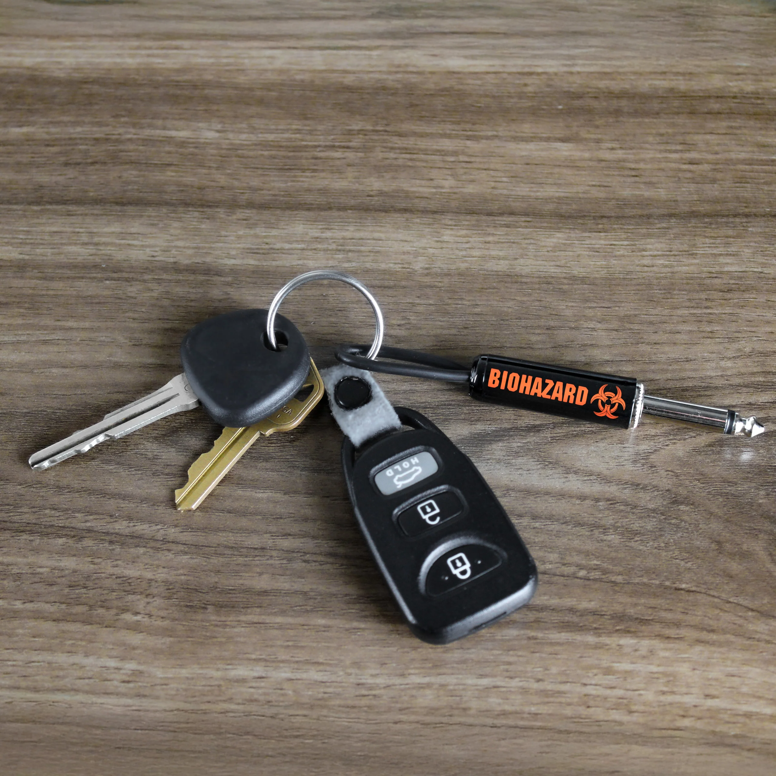 Toxic Orange BIOHAZARD Logo GUITAR Plug KEYCHAIN